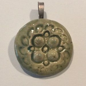 Aromatherapy clay fired pendant